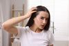 Woman with sensitive scalp